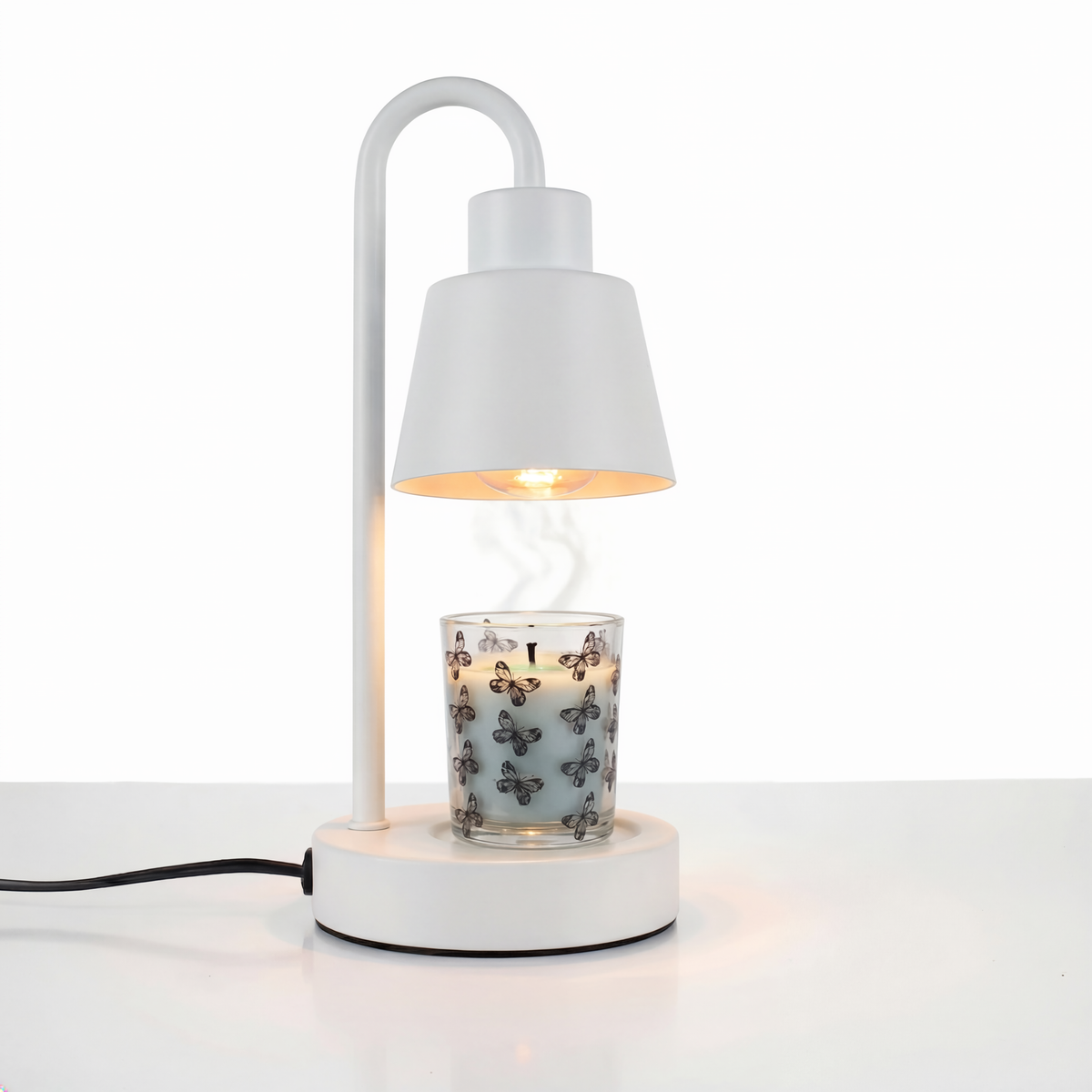 LUMÉA MELT är en aromalampa som smälter doftvax med värmekälla och sprider arom utan öppen låga. Varmt LED-ljus skapar mjuk stämningsbelysning.
