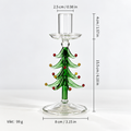 En dekorativ ljushållare i glas med en stiliserad trädform . ljusstakar jul , ljusstakar glas, Julgran form